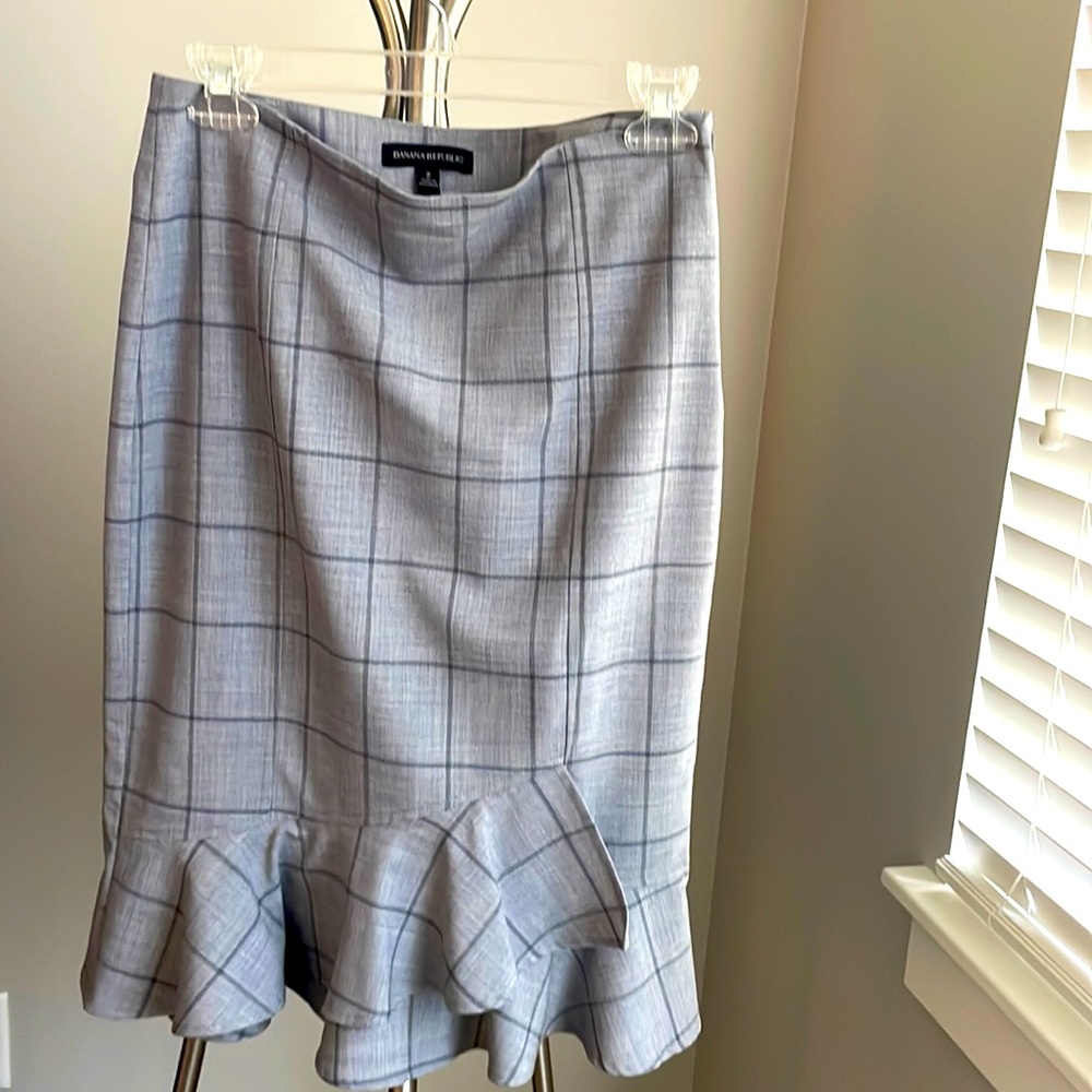 Gray skirt.